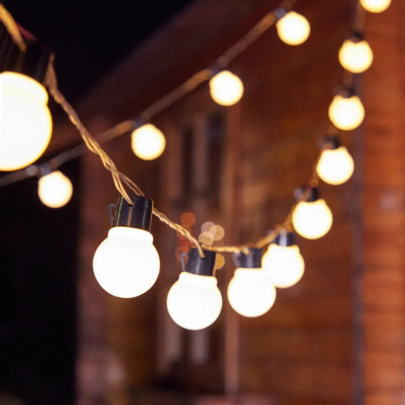 10-metre black wire solar festoon lights with 40 warm white LED bulbs for outdoor decoration