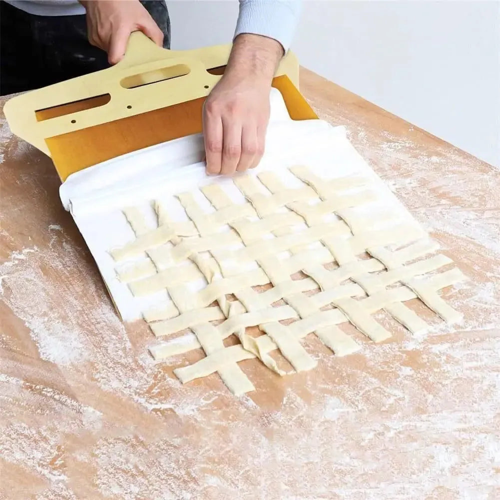 White PP plastic pizza transfer shovel measuring 55cm by 35cm on kitchen counter