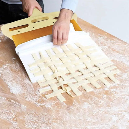 White PP plastic pizza transfer shovel measuring 55cm by 35cm on kitchen counter