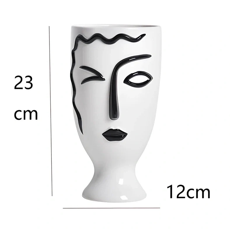 Ceramic vase with hand-painted surface in modern minimalist design, shown in large and small size variations