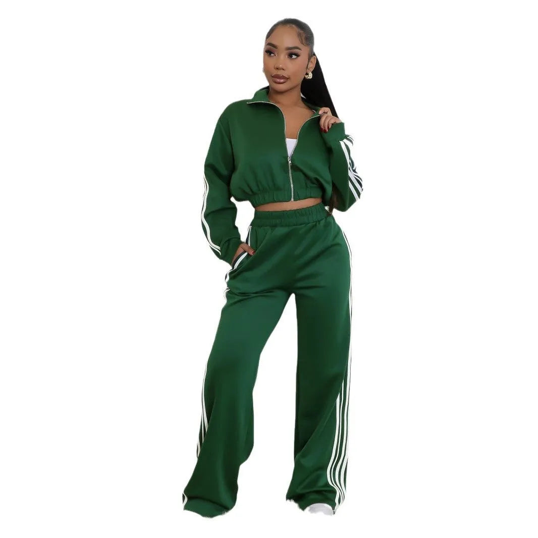 Grey striped streetwear two-piece suit set with zipper detailing on the top and trousers.