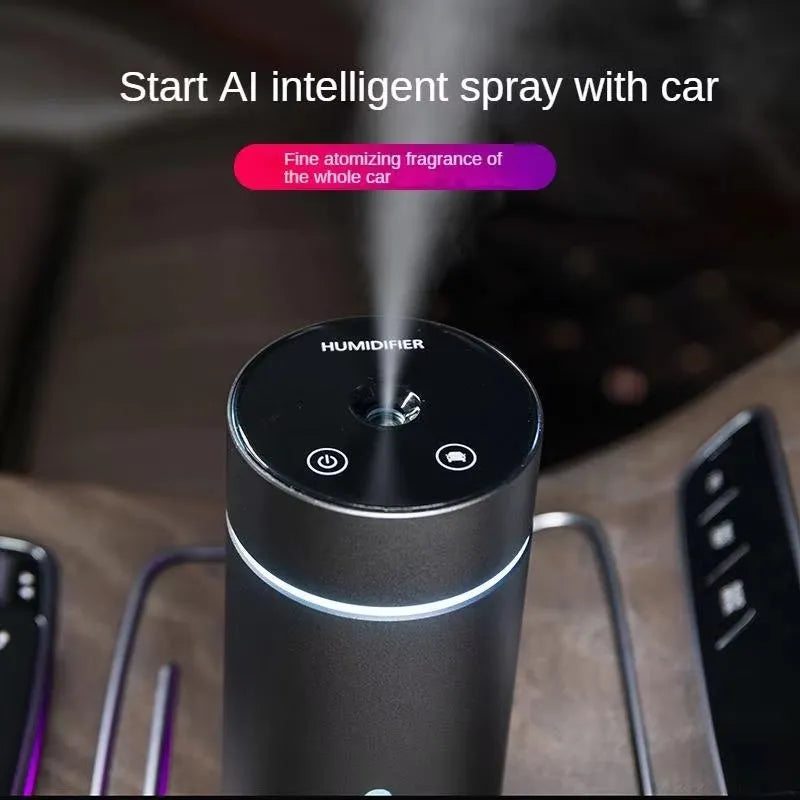 Black aluminium portable car humidifier and essential oil diffuser with night light on desk