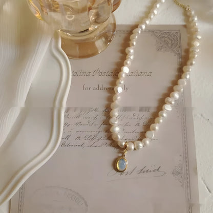 Adjustable French Court vintage pearl necklace with geometric design on alloy chain, showing length variation