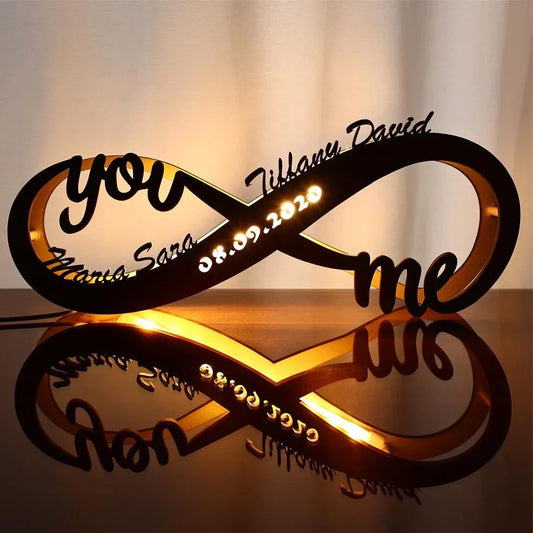 Wooden table lamp with custom name engraving showing modern simplicity design and push-button switch