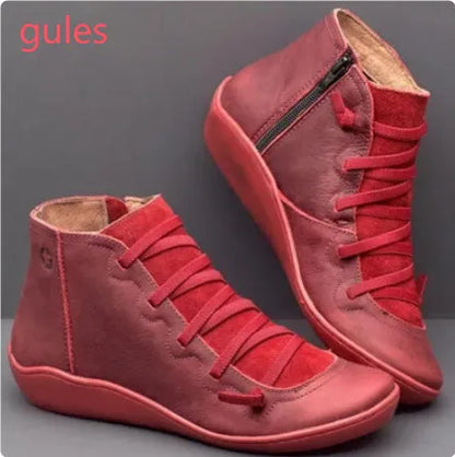 Women's casual booties with wedge heel and round toe in various colours like black and leopard print, showing rubber sole.
