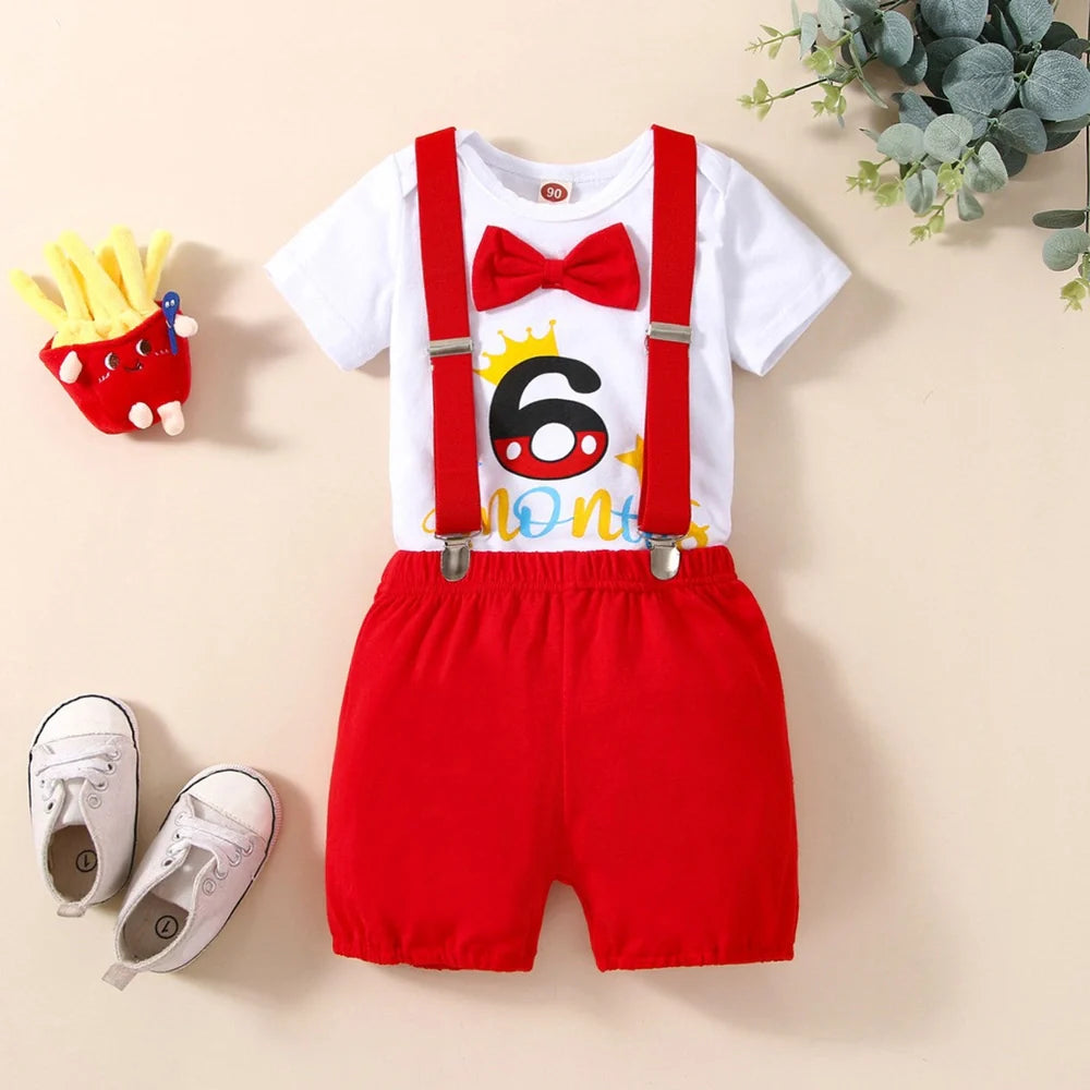 Red cotton baby romper with suspender shorts and printed letters for birthday celebrations