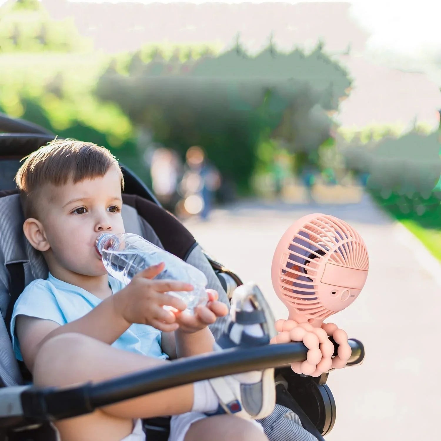 Cute animal-themed mini desk fan with 3 wind speeds, USB rechargeability, and LED lights for strollers, beds, and outdoor use