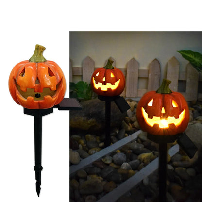 Solar-powered Halloween pumpkin lanterns lighting up a garden at night