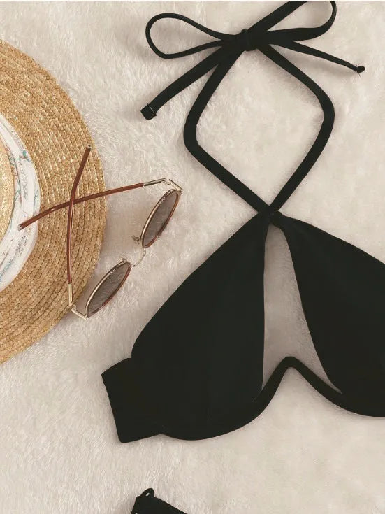 Women's halter neck bikini in solid colour with briefs-style bottoms