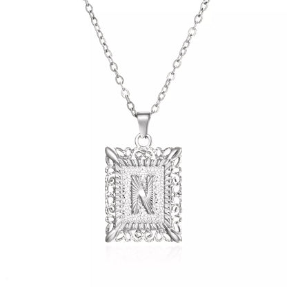 Personalized initial letter necklace in gold or steel, featuring any letter from A to Z