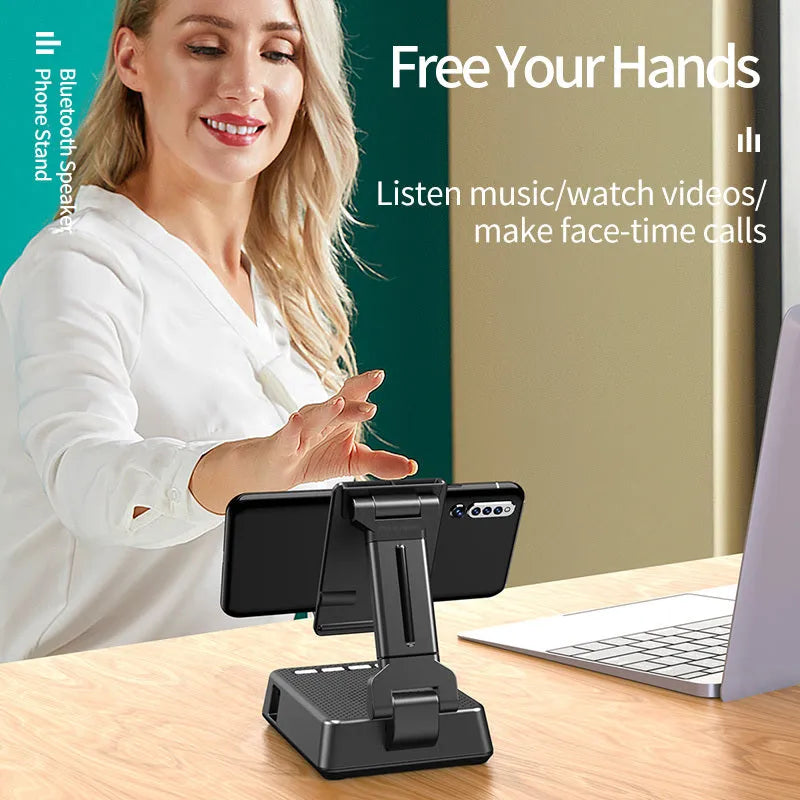 Black mobile phone broadcasting stand with Bluetooth speaker and HD microphone on desk