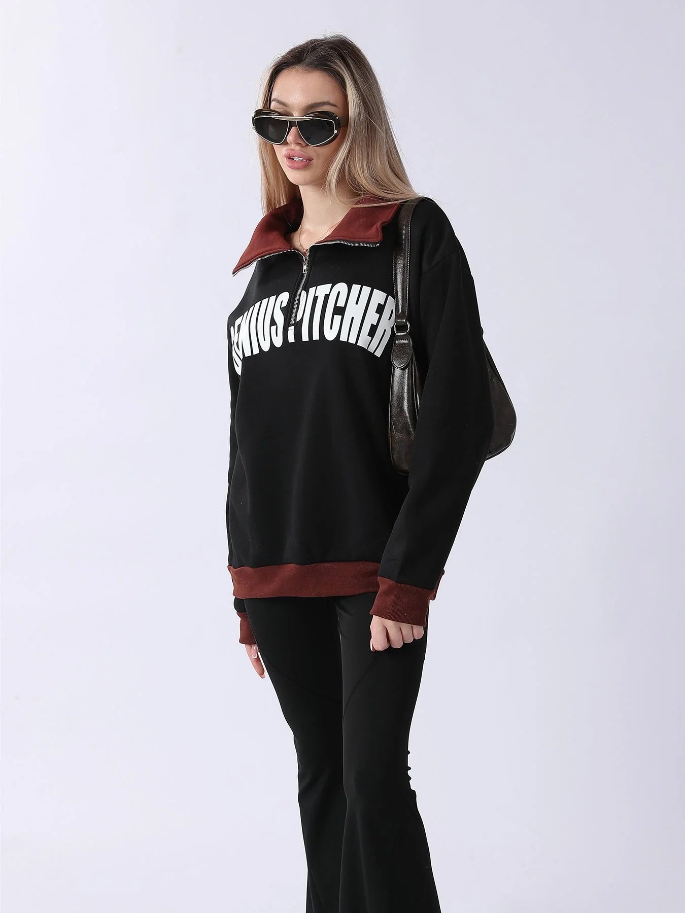 A cozy and comfortable women's long sleeve sweatshirt in black, featuring a relaxed and flattering fit for everyday wear.