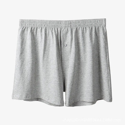Men's cotton boxer shorts in black colour showing loose fit and high waist design