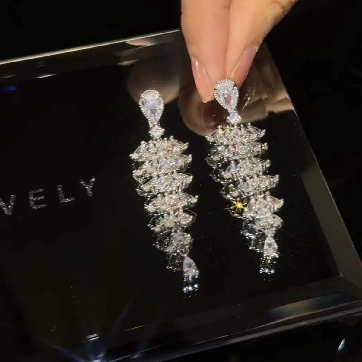 Sparkling crystal Christmas tree earrings with a dazzling design, perfect for holiday parties and events