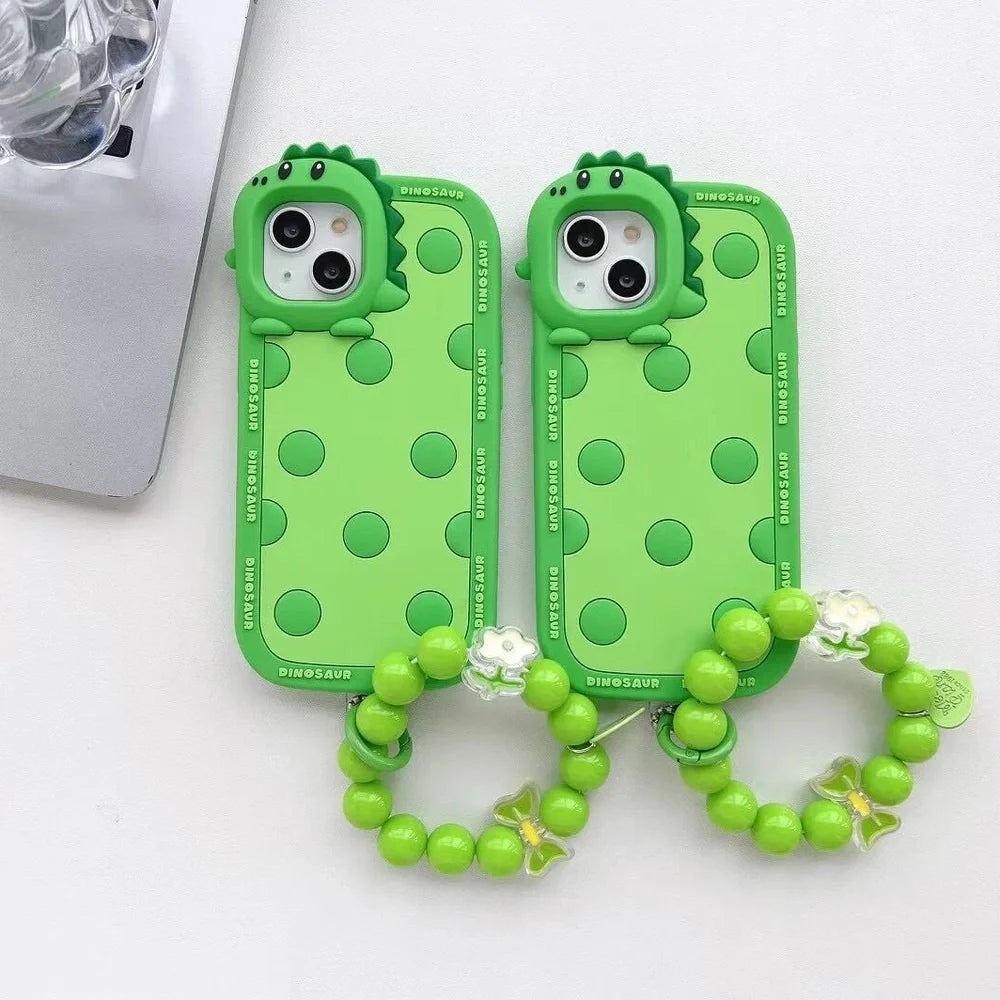 Green polka dot dinosaur silicone phone case showing back design and side protection for iPhone