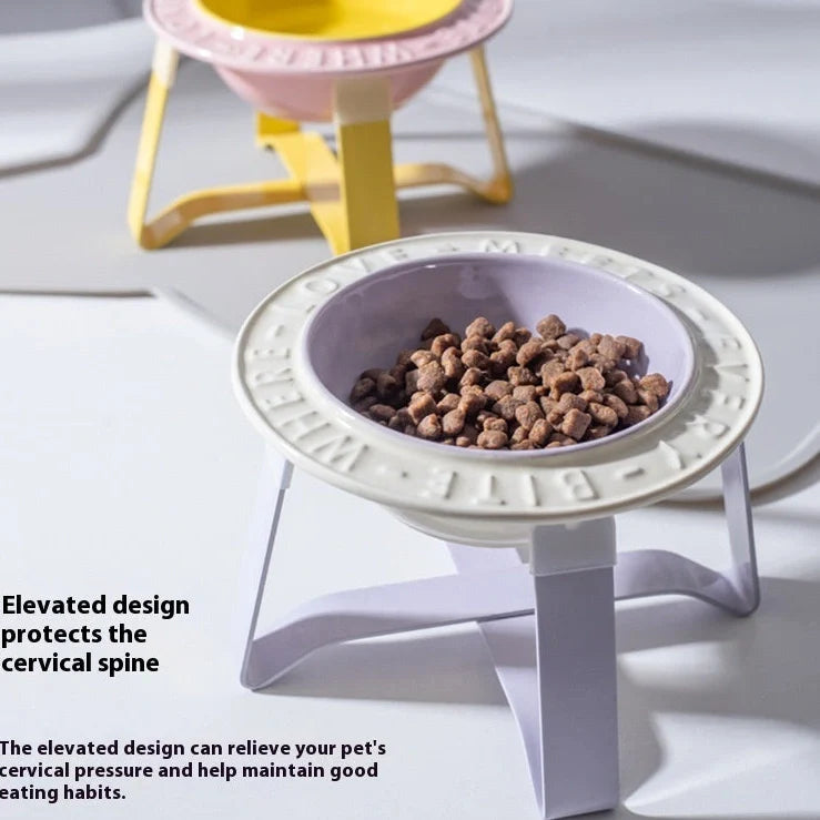 Ceramic cat bowl with iron anti-tip frame in blue colour with silicone pad