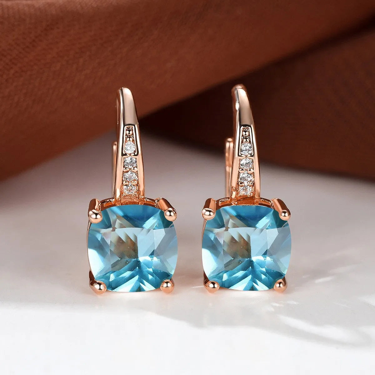 Square zircon inlaid ear hook earrings with geometric design and electroplated finish in golden tone