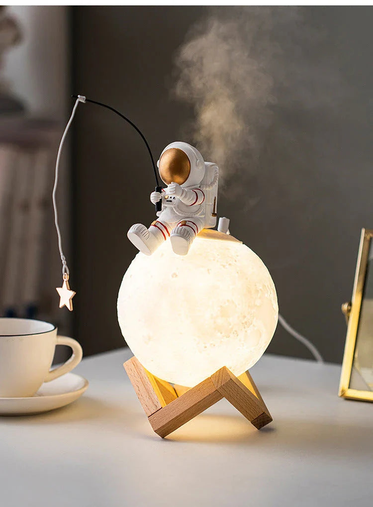 Elegant astronaut figurine with humidifier and night light features, perfect for modern home decor
