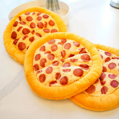 Bright yellow squeaky dog toy shaped like a pizza slice with a soft teddy fabric surface