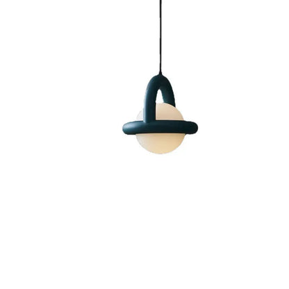 Danish designer hanging line lamp with adjustable cord and matte finish in bedside setting