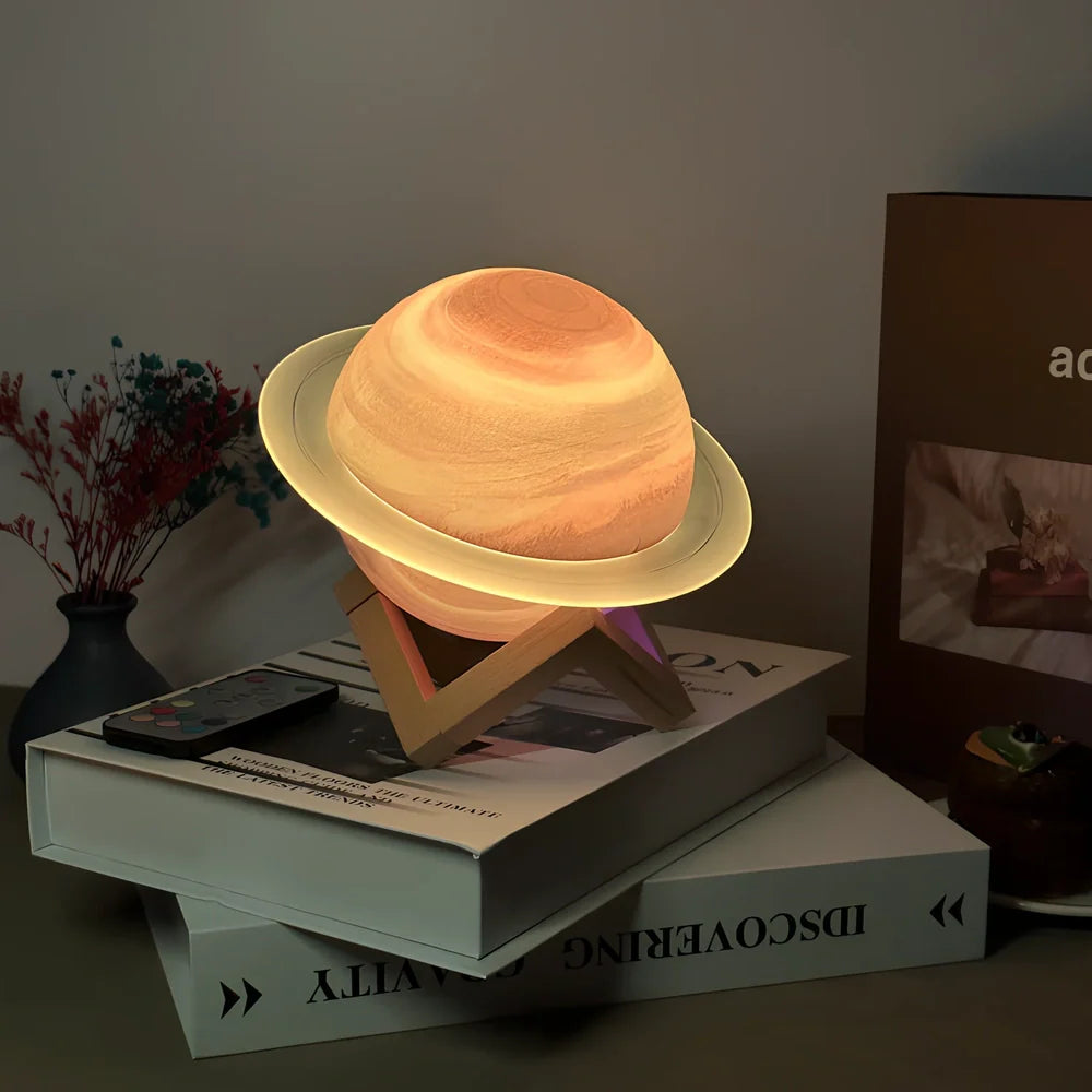 Rings of Saturn Dream Bluetooth Speaker showing 16.5cm dimensions with remote control and bracket accessories