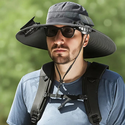 Man wearing a solar-powered fisherman hat with built-in fan for outdoor fishing or hiking