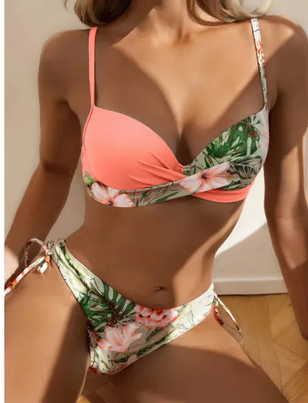 Women's two-piece bikini swimsuit with push-up padding and drawstring design in printed polyester fabric