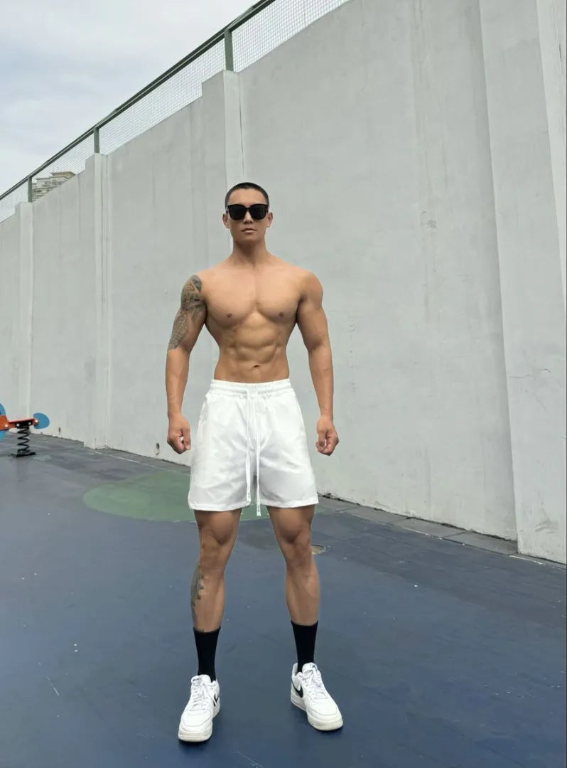 Men's ice silk quick-drying double-layer shorts in quarter-length design with nylon fabric