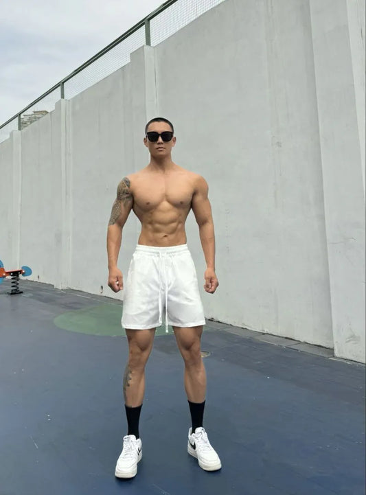 Men's ice silk quick-drying double-layer shorts in quarter-length design with nylon fabric