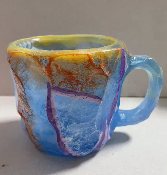 400ml resin mineral crystal coffee mug with handle in assorted colours including purple, blue, and pink.