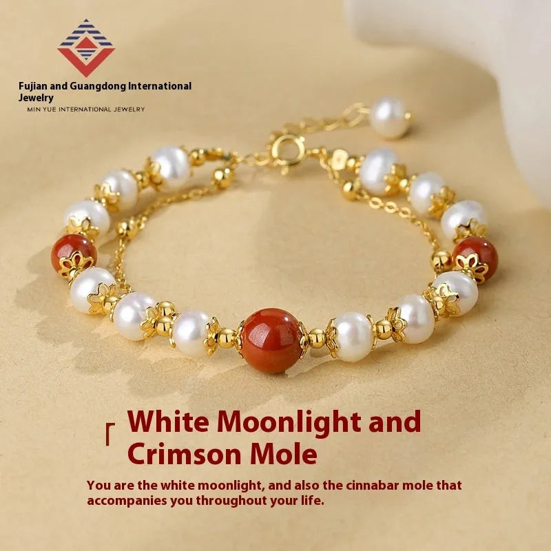 Sterling silver double-layer bracelet with freshwater pearls and red cinnabar bean charms