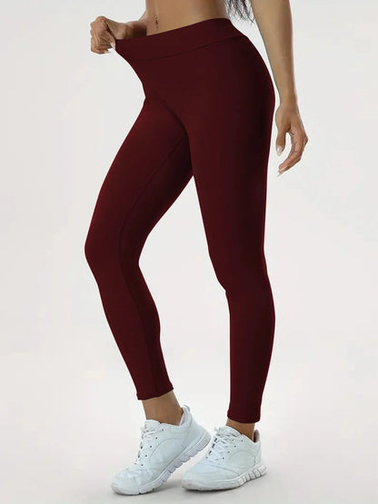 Slimming high-waist yoga pants with hidden tummy control, available in various colors and sizes