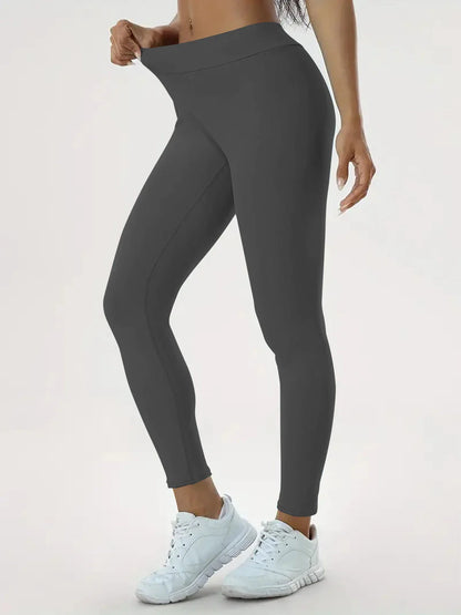 Slimming high-waist yoga pants with hidden tummy control, available in various colors and sizes
