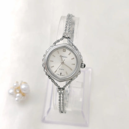 Women's gold and silver mori style quartz watch with 25mm dial and chain strap