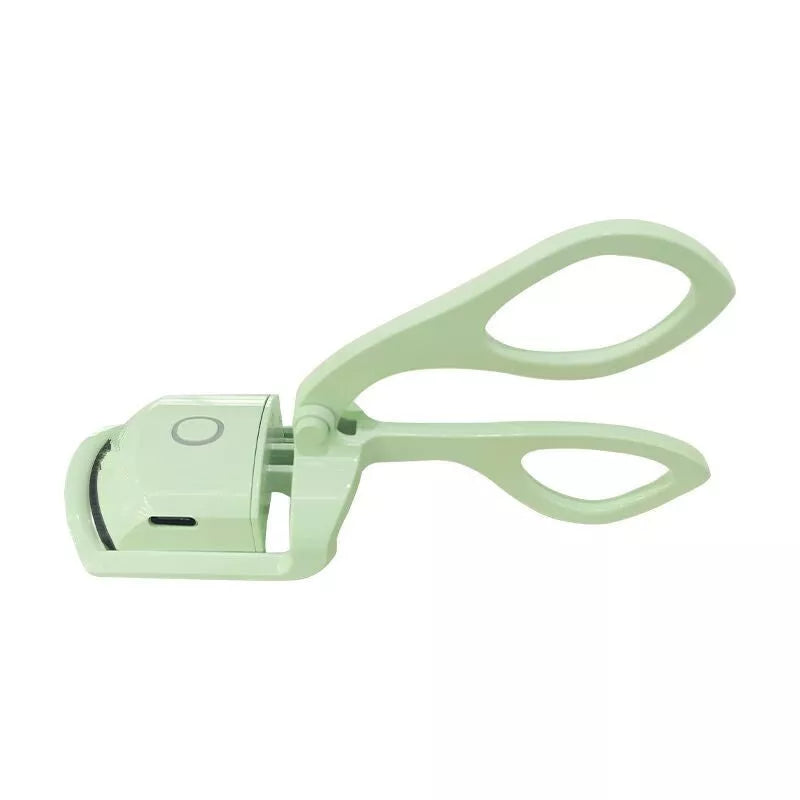 Electric Heating Eyelash Curler in white, pink, and green colors for safe, effective lash curling