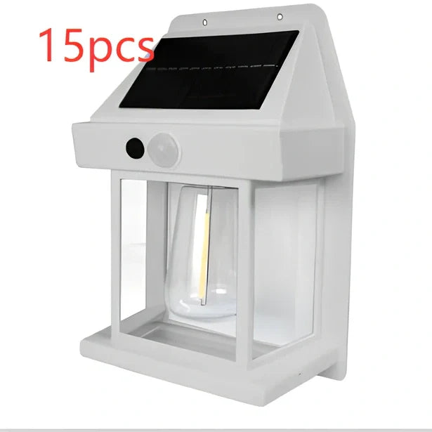 Black solar garden wall lamp with waterproof IP65 rating and automatic light sensor for outdoor installation