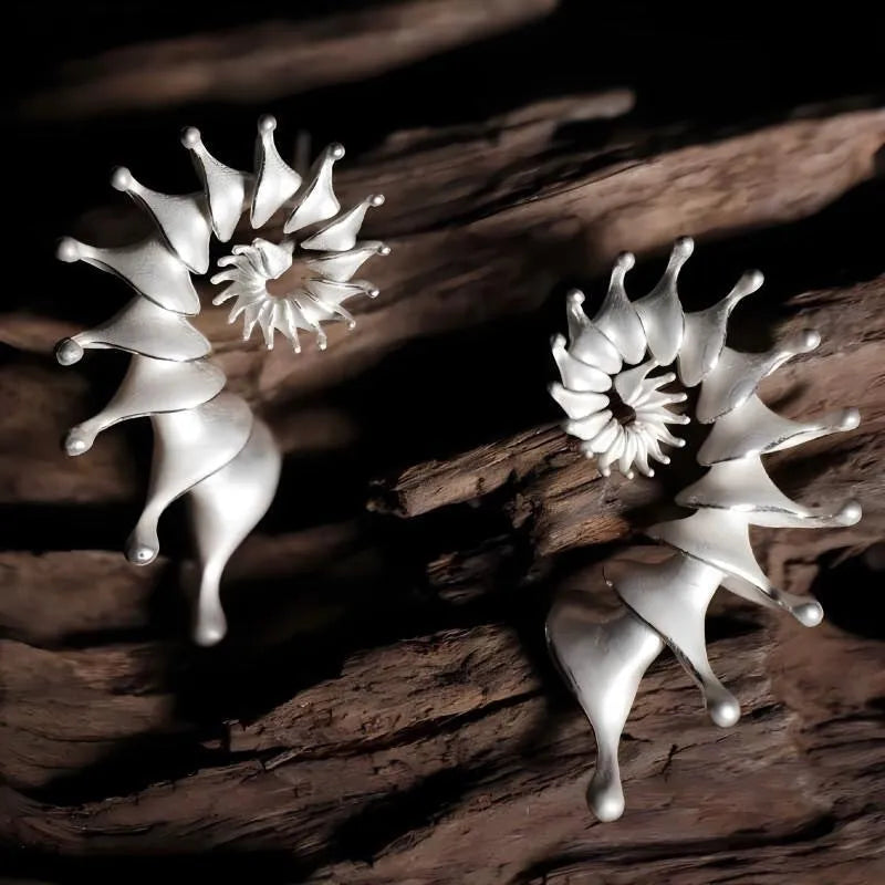 Conch three-dimensional matte stud earrings with irregular shape and electroplated alloy construction