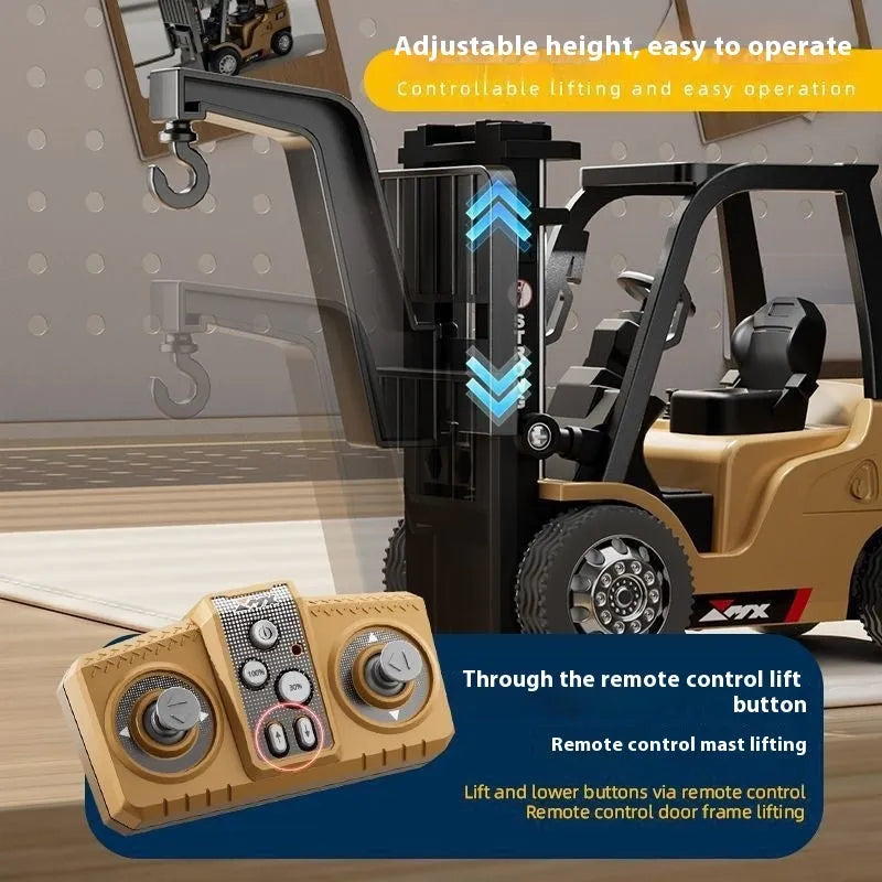 Miniature grey alloy remote control forklift toy with cargo forks and a pallet on a table.