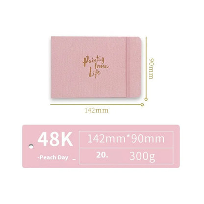 Feiluniao watercolour notebook with fabric cover, 185mm length, open to show paper for painting.