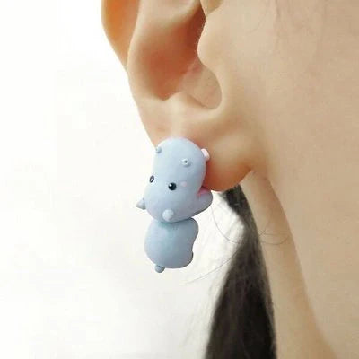 Funny animal bite earrings featuring dinosaur and whale designs in various colors