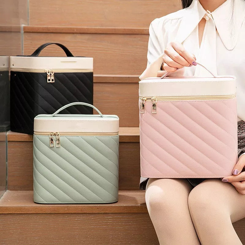 Portable PU leather cosmetics and jewelry storage box with hard handle and zipper pockets