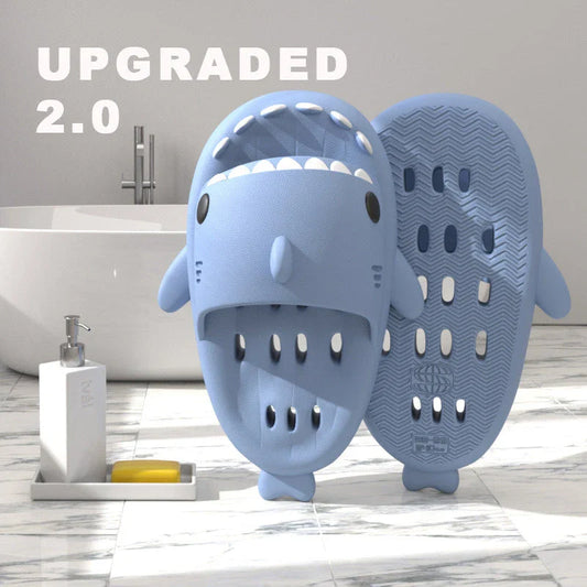 Colorful shark-themed shower slides with drainage holes, designed for comfortable and practical use in the pool or shower.