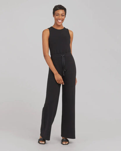 Women's lace-up jumpsuit pants in polyester, available in multiple colors and sizes for adjustable fit.