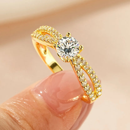 Women's geometric copper ring with electroplated finish and cubic zirconia stone in choice of six styles.