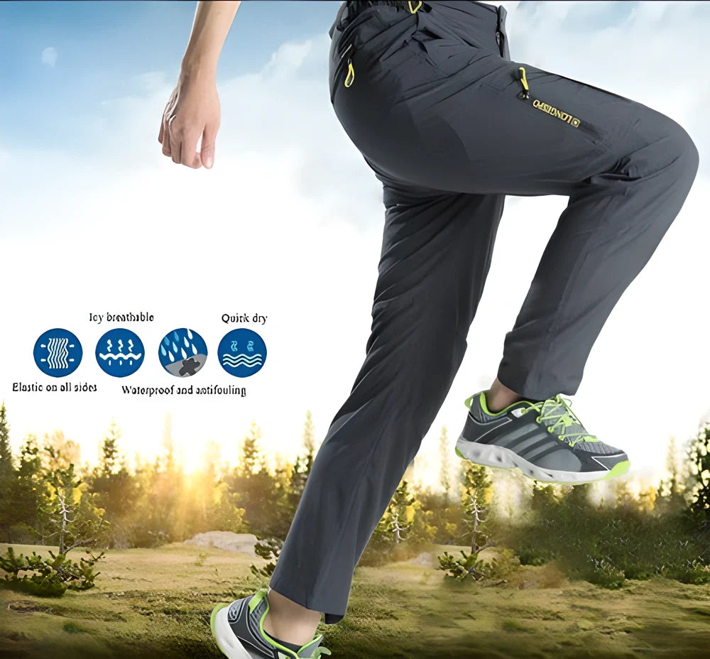 Versatile stretchable cargo pants for men with reinforced stitching, water-repellent properties, and convenient zipper pockets for outdoor adventures
