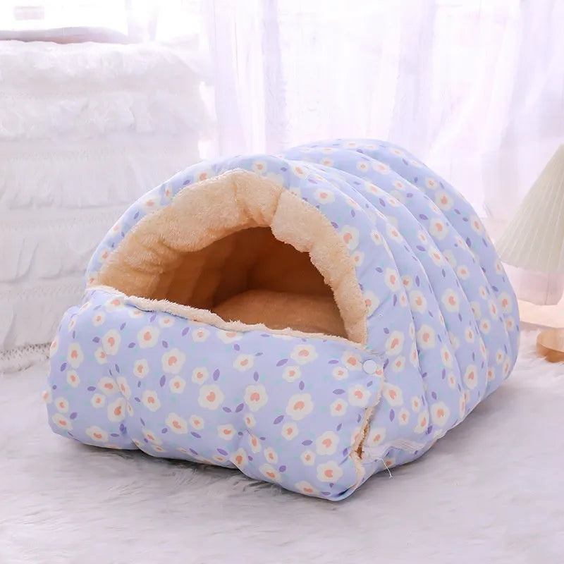 Closed winter cat nest with floral pattern, showing removable design and soft cloth fabric.
