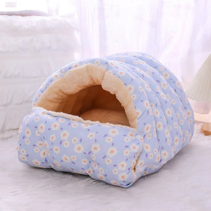 Closed winter cat nest with floral pattern, showing removable design and soft cloth fabric.