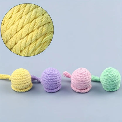 Interactive cat toy ball with bell and rope in green, pink, purple or yellow colours, shown in 3cm and 6cm sizes
