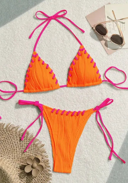 Women's solid colour polyester bikini with eye rope detail, briefs style, sizes S M L