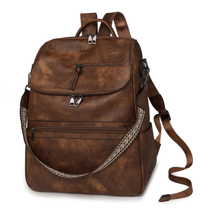 Retro college student backpack with curved shoulder straps in multiple colour options including black, blue, and yellow apricot